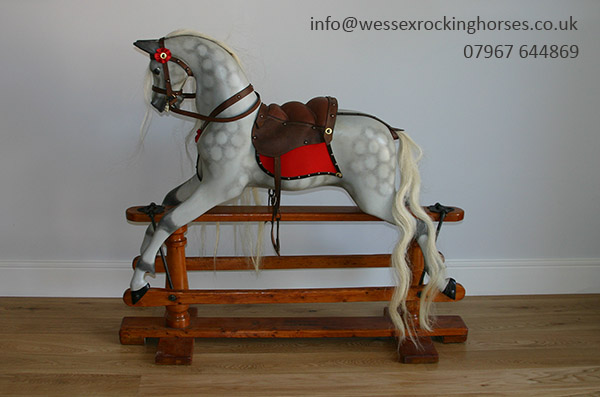 restored dapple grey rocking horse